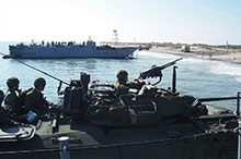 A LAV-III crew of the Royal 22e Regiment makes an amphibious landing during an exercise proving the Standing Contingency Force concept of operations, November 2006.