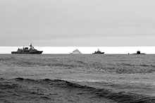 Left to right: HMC Ships Fredericton, Summerside, and Corner Brook sail in formation past an iceberg during Operation Nanook, August 2007.