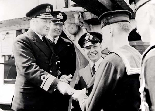 On July 29, 1942, Rear Admiral L.W. Murray presented awards to crew members of His Majesty’s Canadian Ship St. Croix, which sank enemy submarine U-90 on July 24, 1942.