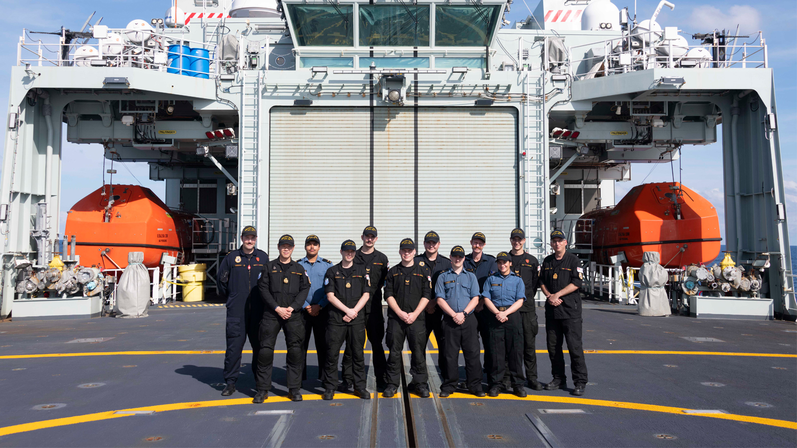 slide - The reservists on board Her Majesty’s Canadian Ship Harry DeWolf.